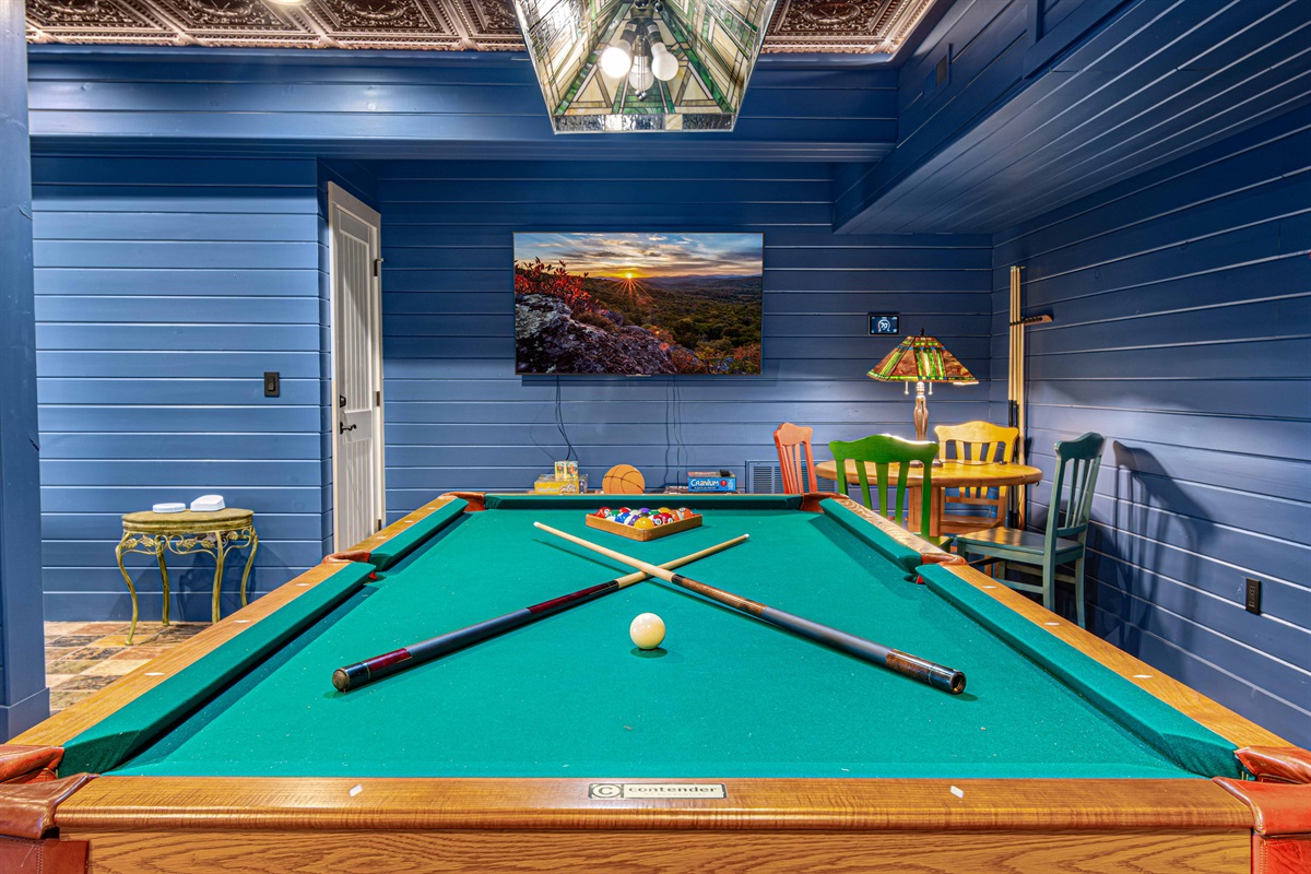 Game Room: Unwind with a pool table, colorful seating, and a cozy vibe for fun-filled evenings!