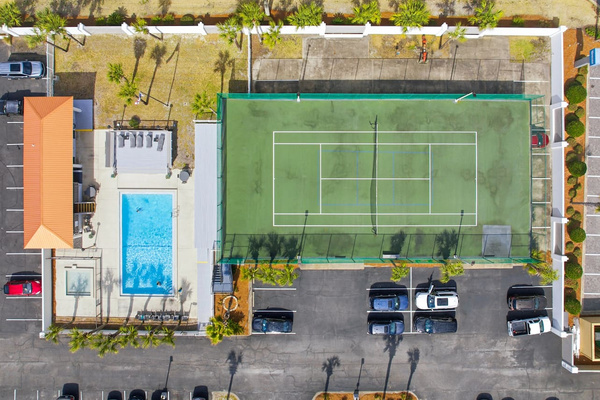 Surf Dweller complex has tennis court, pool and kiddie pool