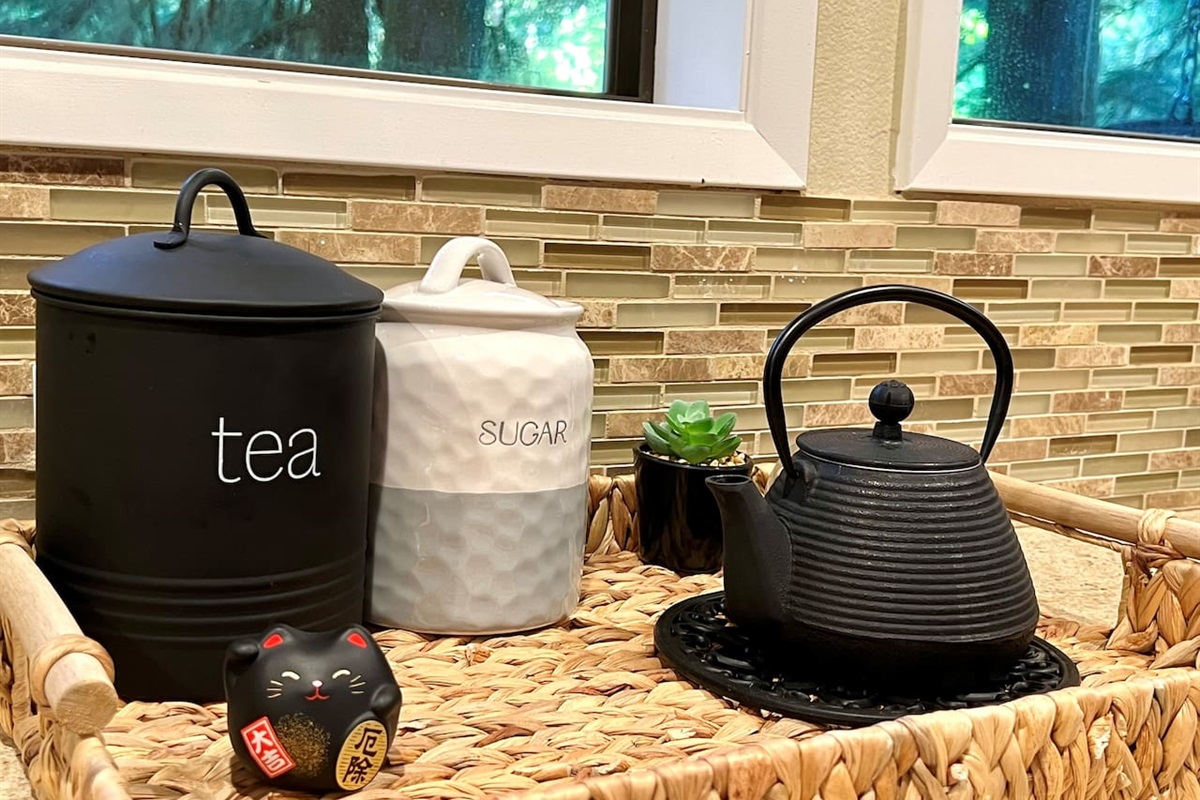 Tea area includes tea pot and electric kettle
