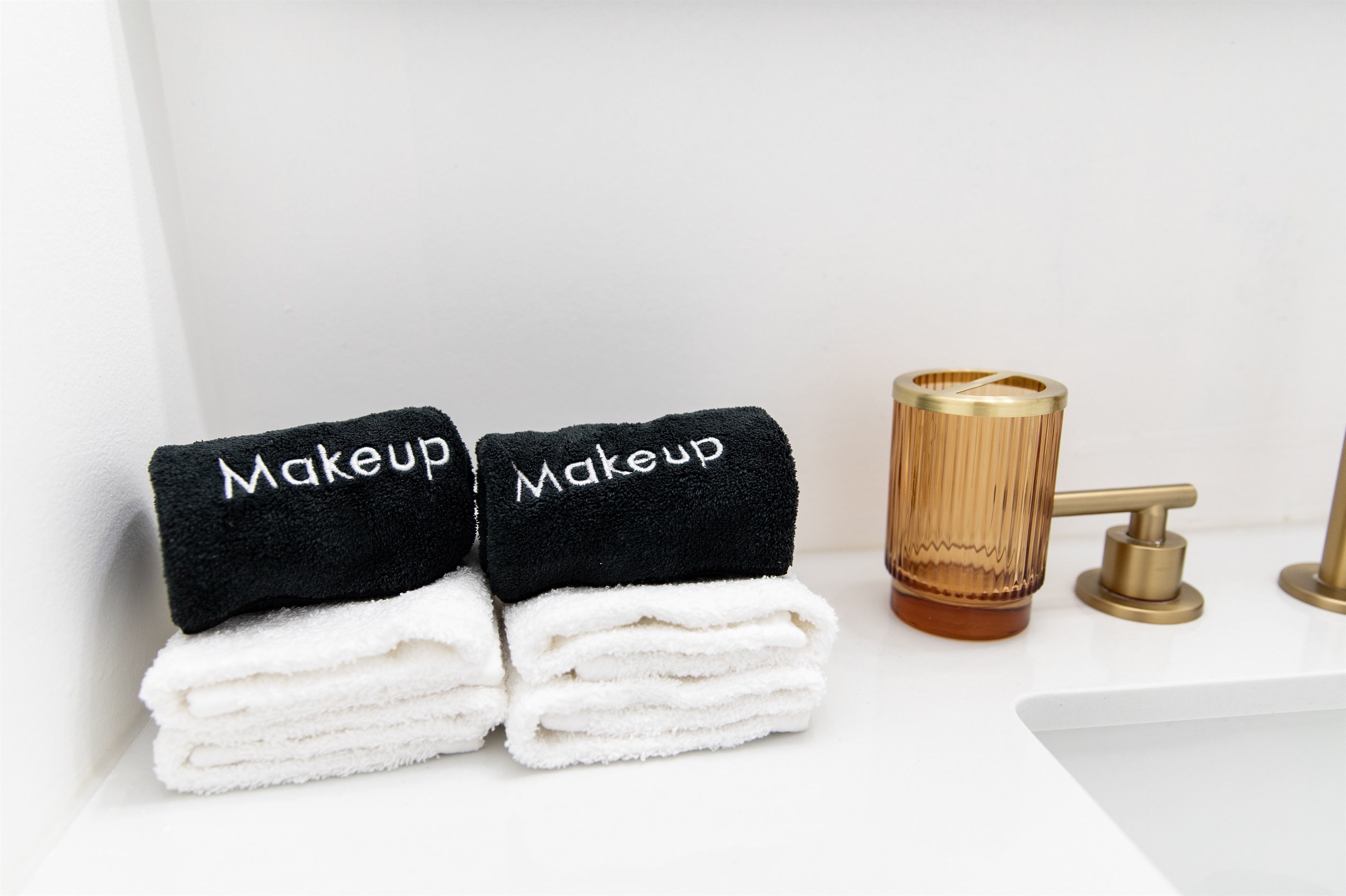 Fresh towels, and thoughtful touches including designated makeup cloths for guest convenience.