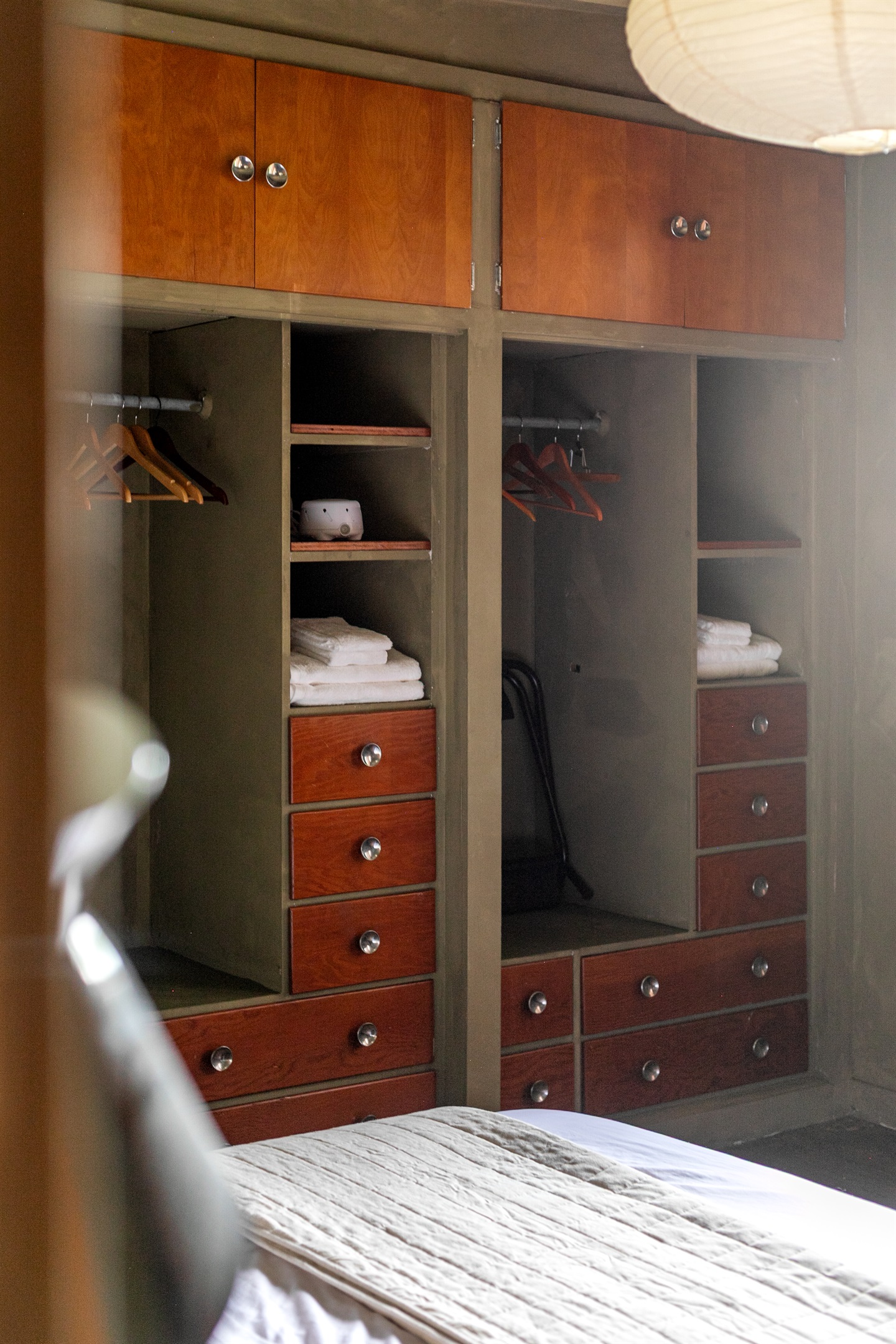The primary bedroom offers both comfort and practicality, with abundant storage that makes it easy to unpack and feel at home.