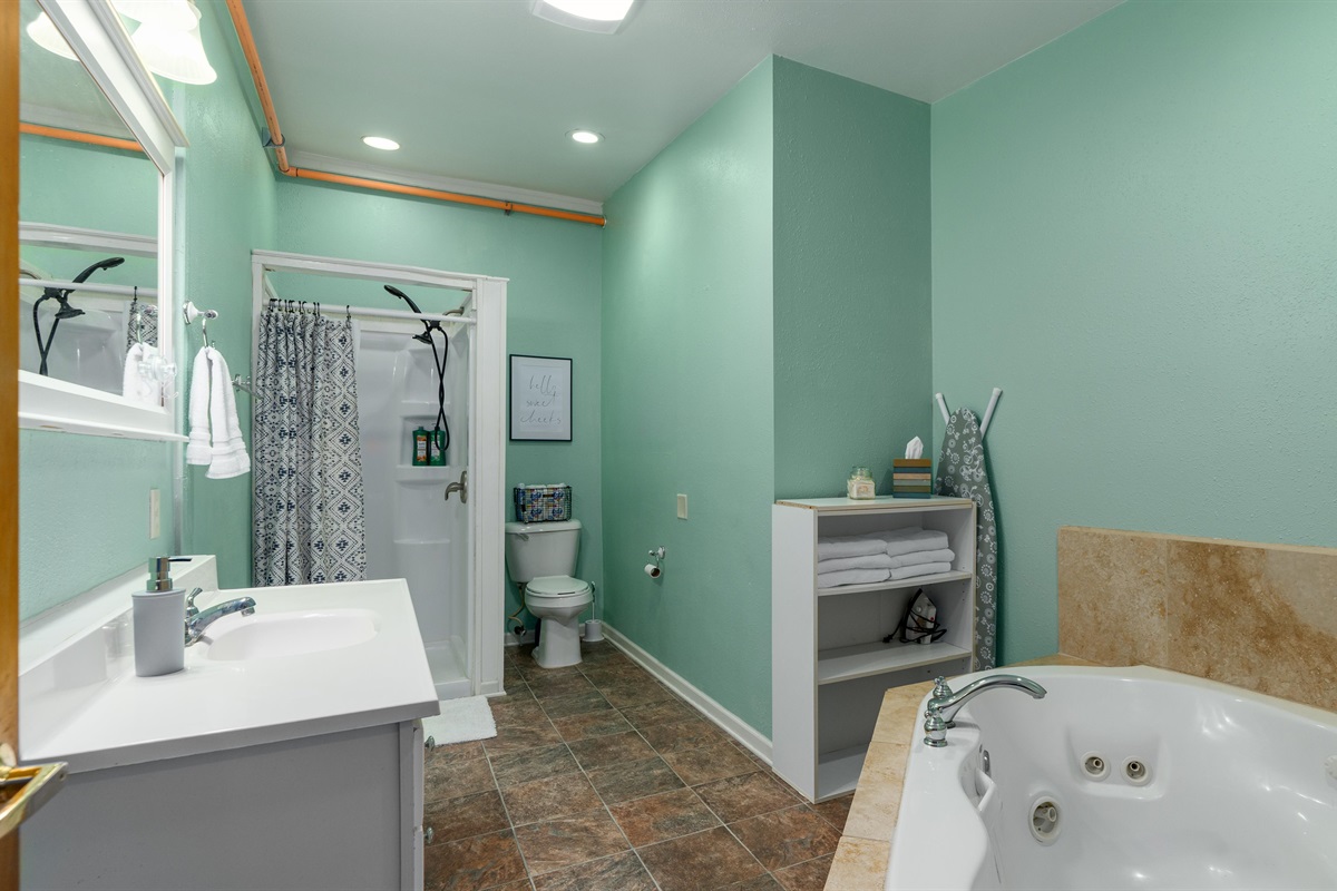 The large bathroom features a jetted tub for two!
