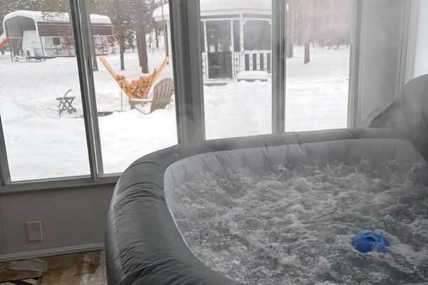 Chill out in our hot tub, slide open a window and observe nature!