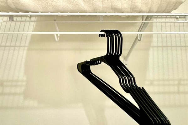 Each bedroom has an extra blanket and hangers 