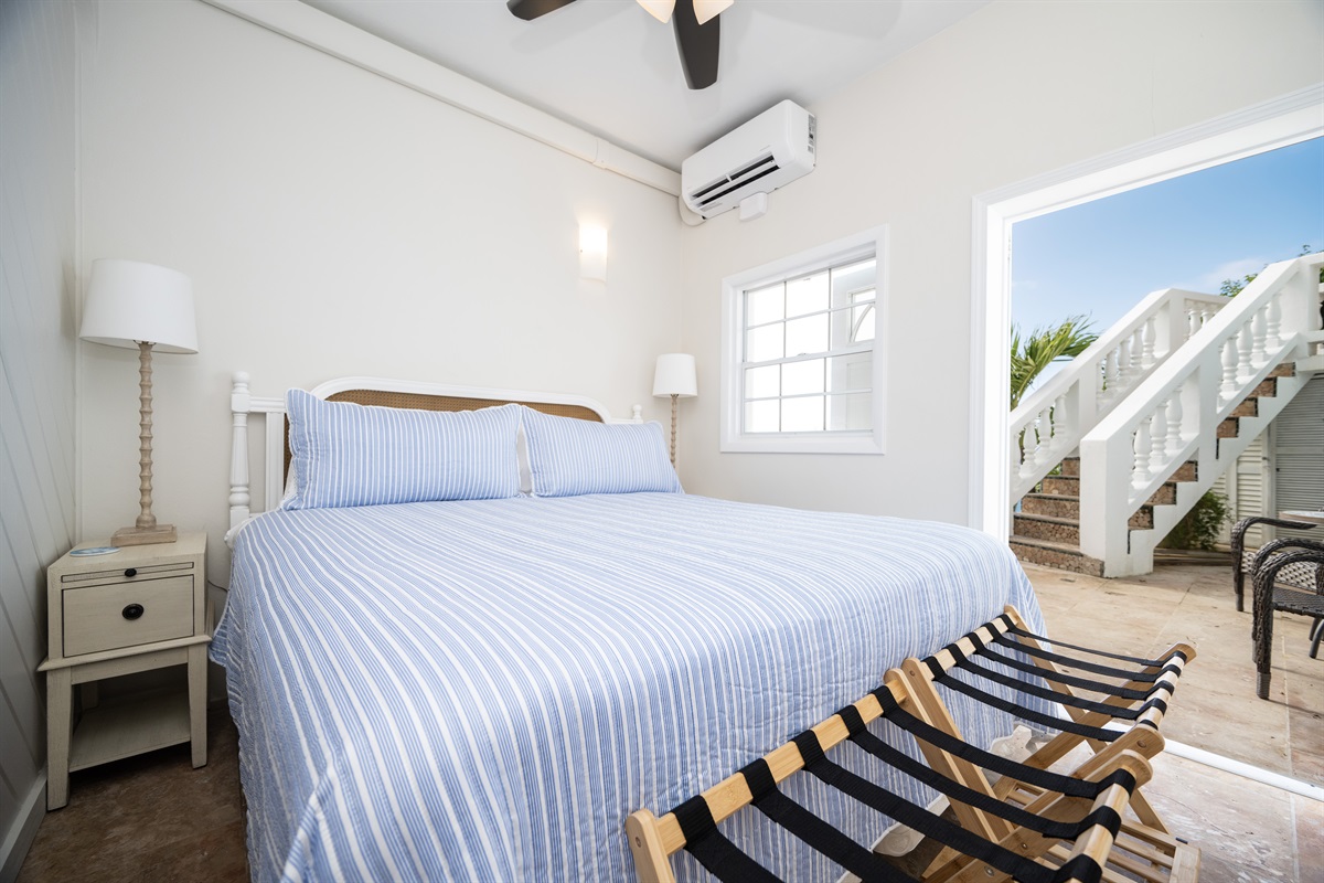 Pool bedroom 2 with a kind bed and a twin trundle. This room can accomodate up to four guests. Works great for parents and two kids.