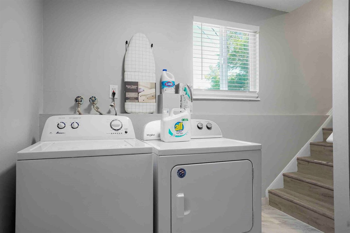 Oversized washer and dryer to accommodate our guests, along with a ironing board and iron.