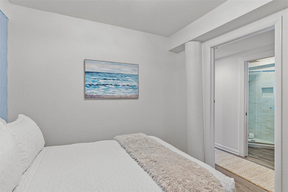 1st Floor - Bedroom 6: Full Bed, access to hallway Remodeled Bathroom with walk in shower, Smart TV (Sleeps 2)