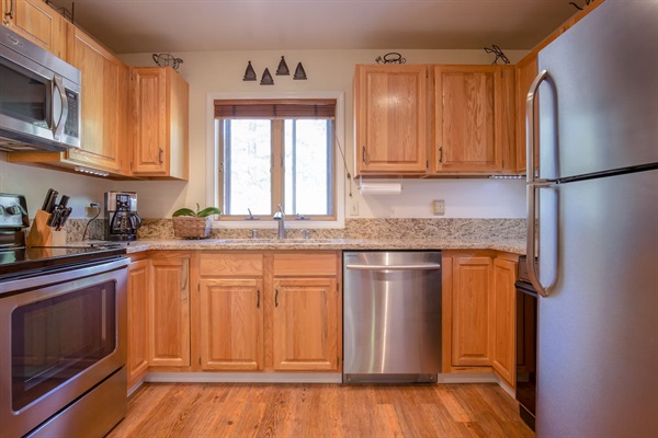 Beautiful granite slab and stainless steel appliances. Dishwasher is especially quiet.