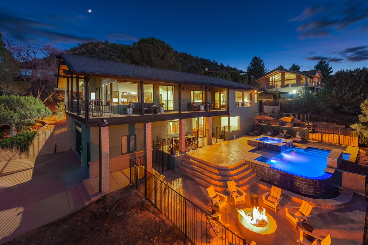 Your private retreat after dark, soak in the spa, gather by the fire, and enjoy the glow of the red rocks.