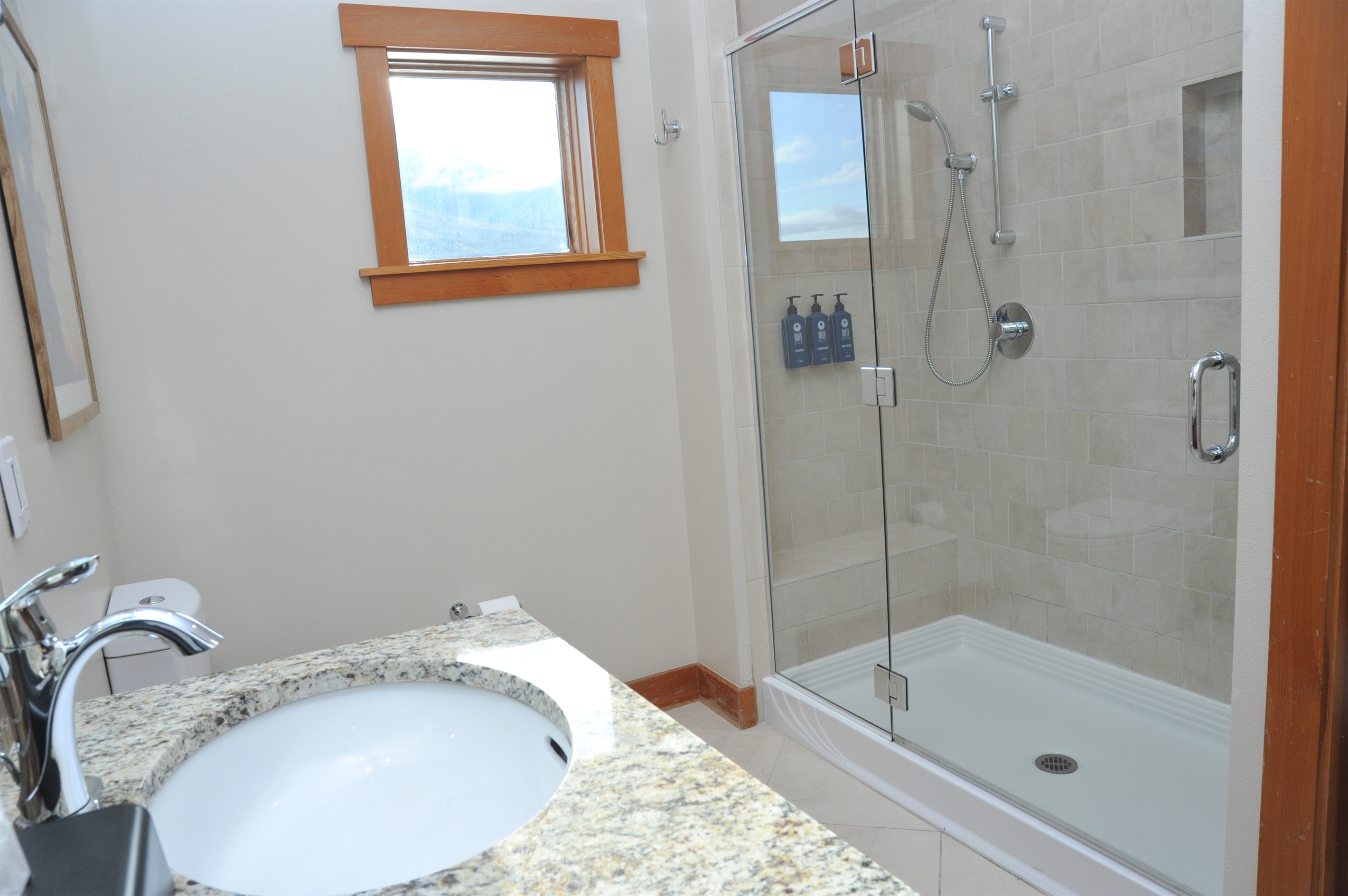 Bathroom #1 of 2: ensuite bathroom to the primary bedroom with walk in shower