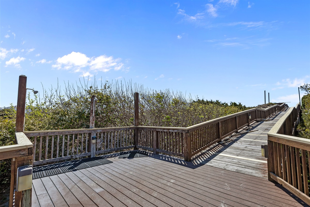 Beach access deck with outdoor showers to rinse off after the sand and surf
