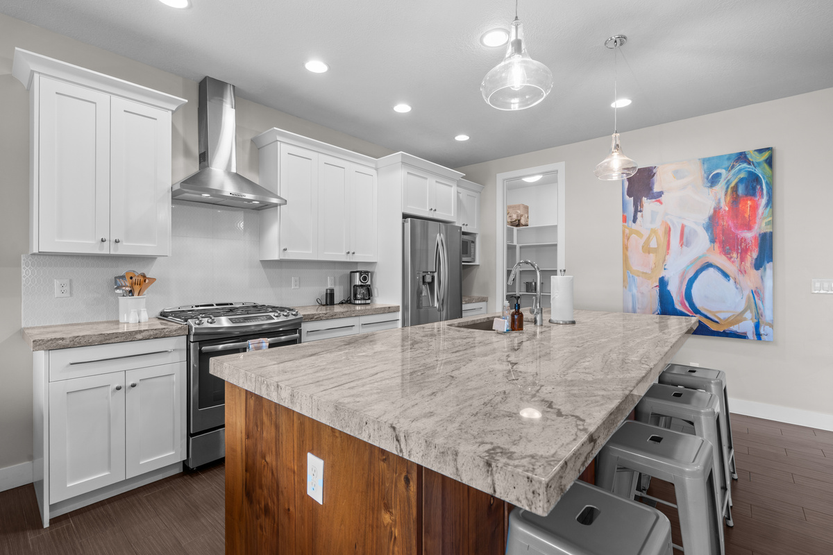 Cook, gather, and connect in the gourmet kitchen with an oversized island.