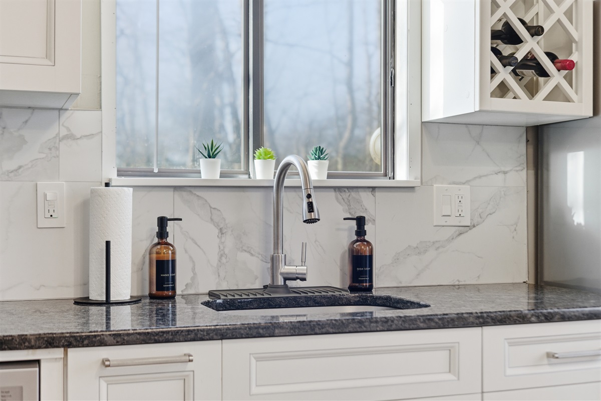 Kitchen with stainless steel appliances and granite countertops