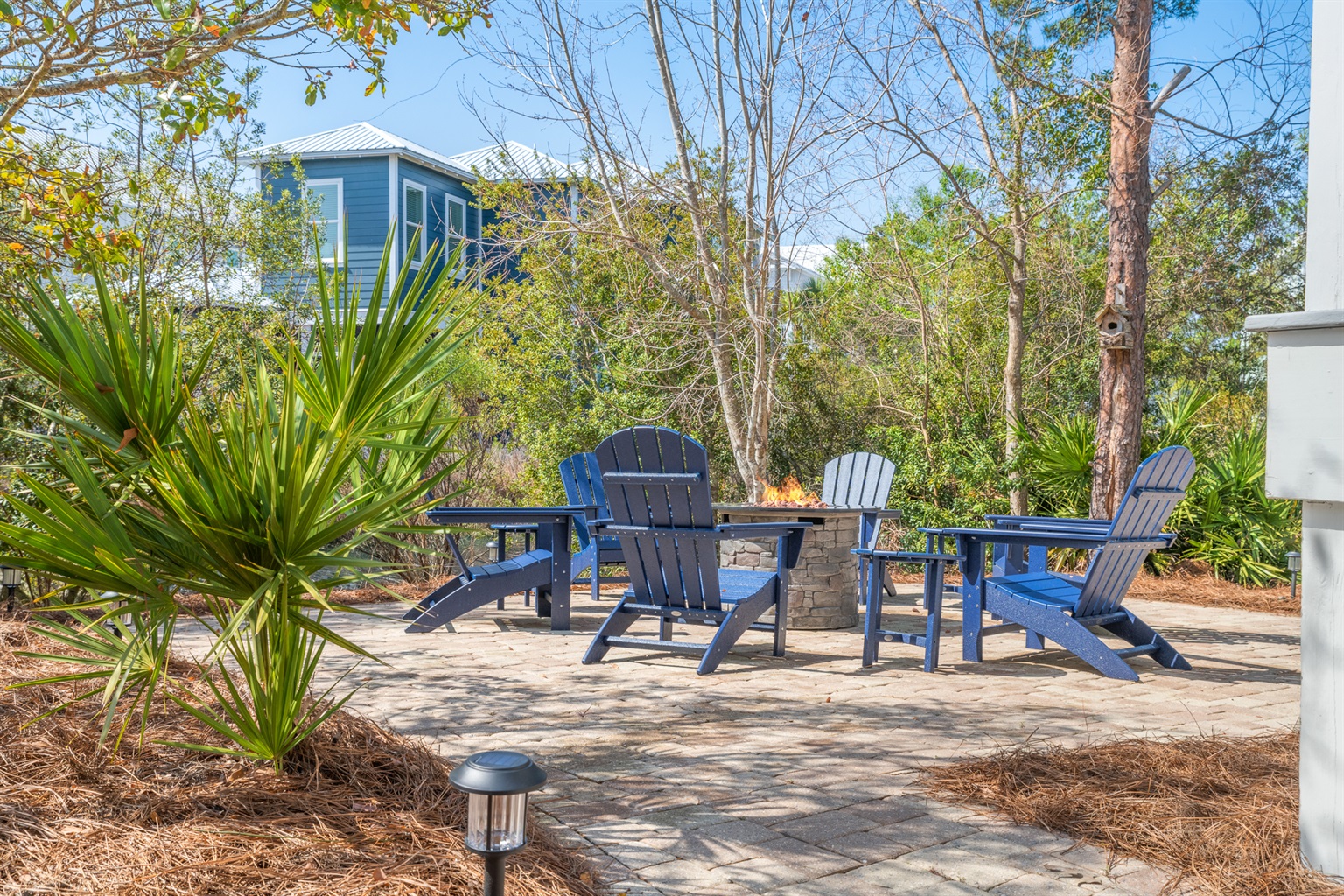 Enjoy the ambiance and the sounds of the fountain as you cozy in by the fire pit. 