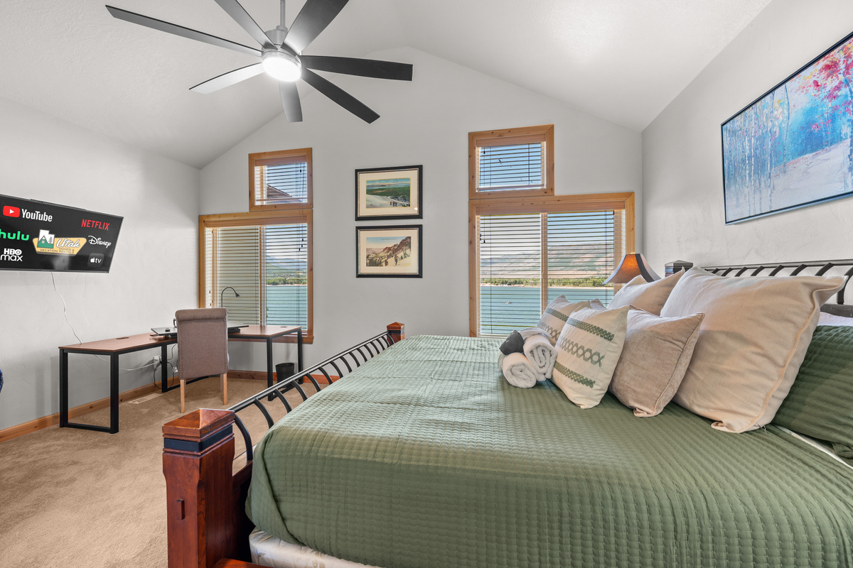 Spacious primary suite combining comfort, scenery, and functionality.