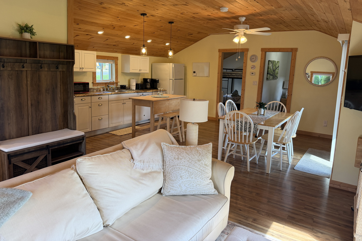 Open concept living, dining and kitchen areas
