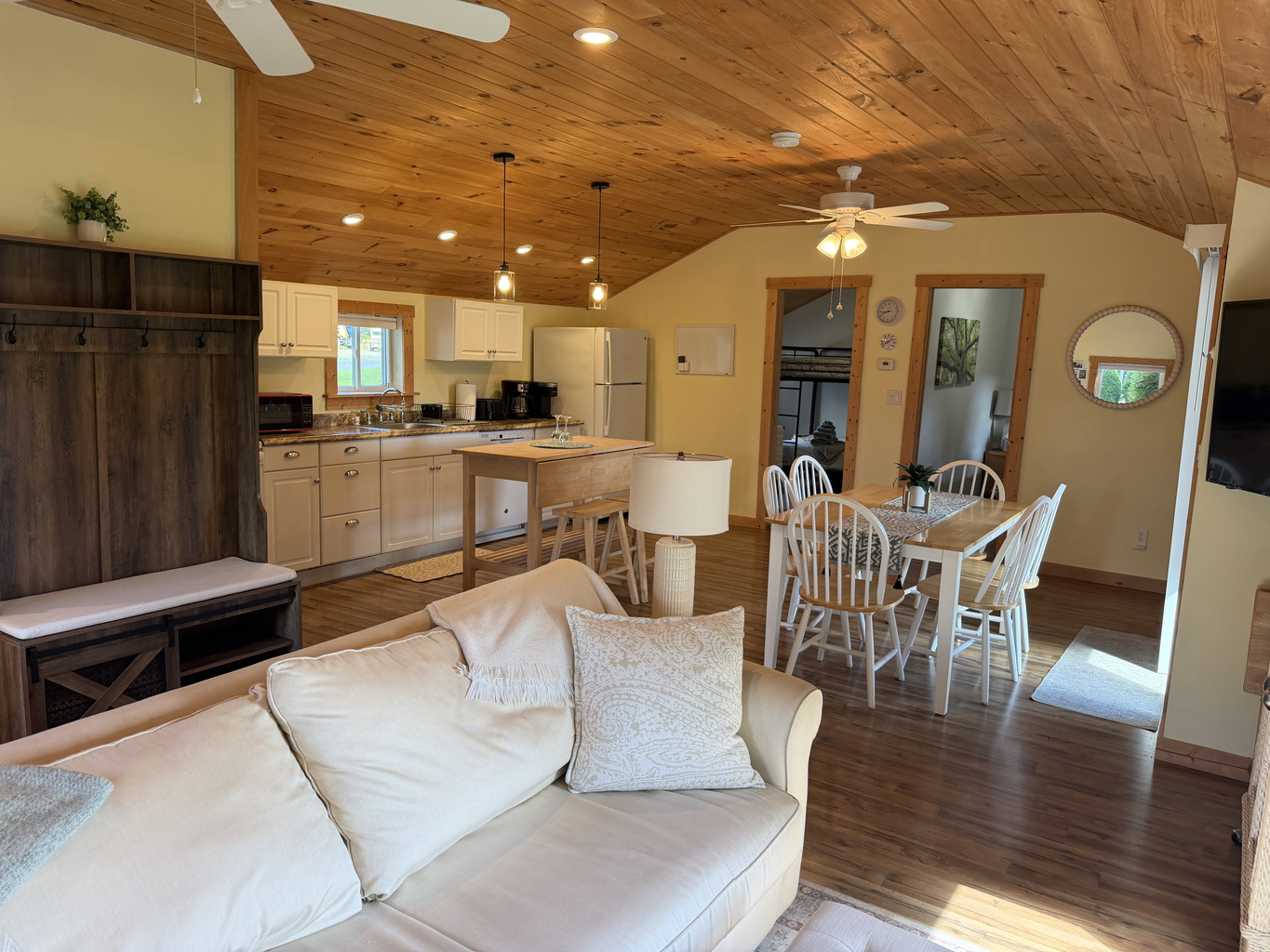 Open concept living, dining and kitchen areas