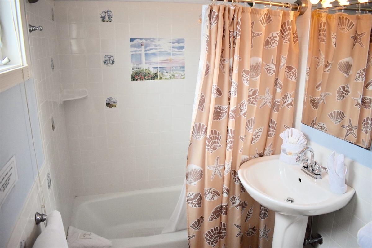 Bathroom has full bath and comes complete with full stock of towels and complimentary soaps and shampoo
