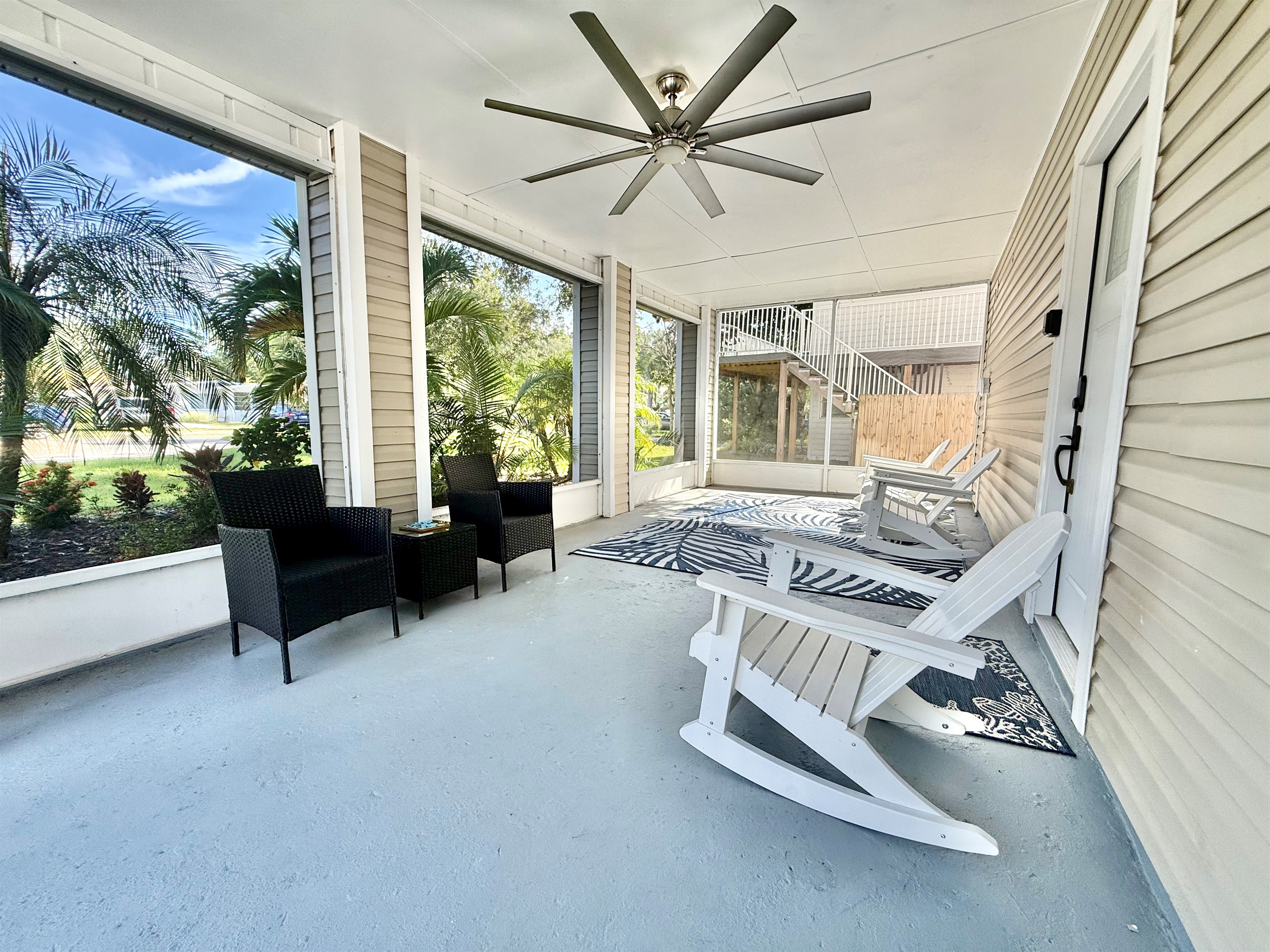Rocking chairs and lounge seating make this the perfect spot for conversation or quiet reflection.