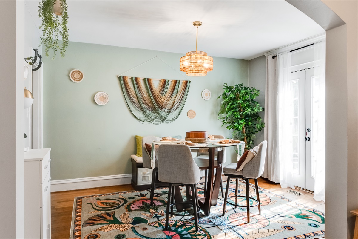 Dining Room: Gather around a stylish table with vibrant decor and natural light streaming in!
