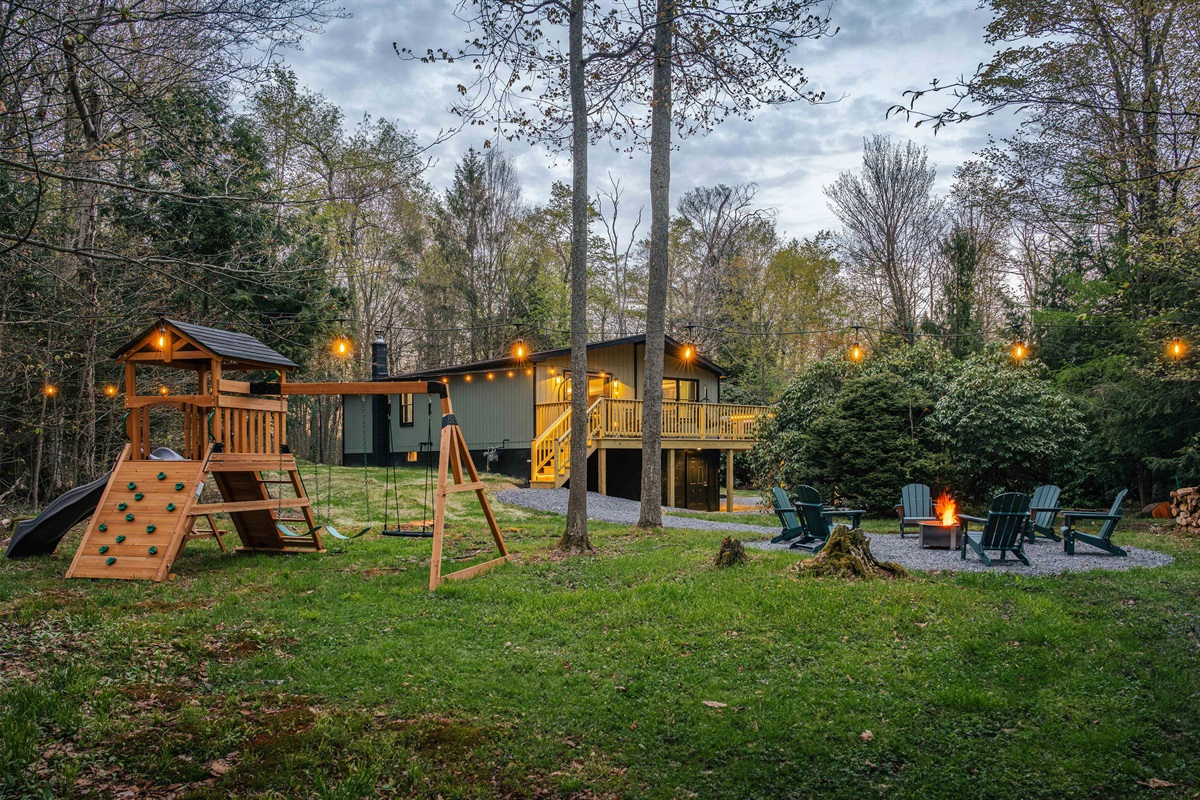 🛝 A big play set with swings, climbing wall, treehouse, and slide keeps the kids busy for hours.