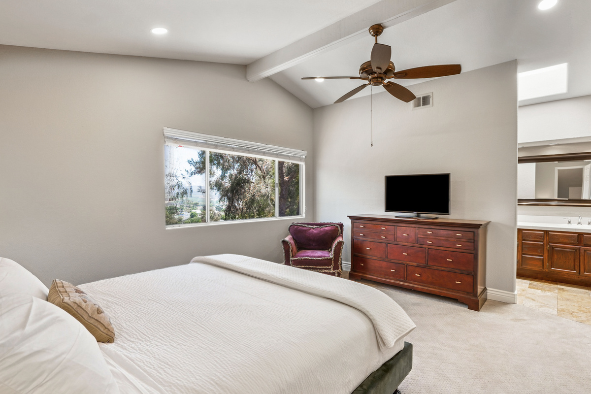 Relaxing Primary Suite with Premium Helix Mattress, Walk-In Closet & Private Office