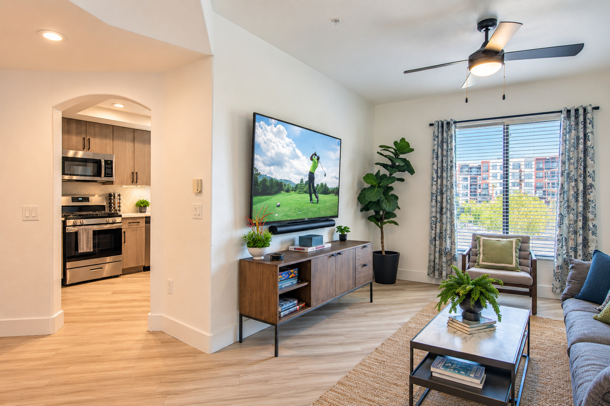 - Watch your favorite shows on a flat-screen TV in a bright lounge   - Contemporary furniture and soft hues offer a welcoming feel   - The perfect corner to unwind after pool time or golf sessions