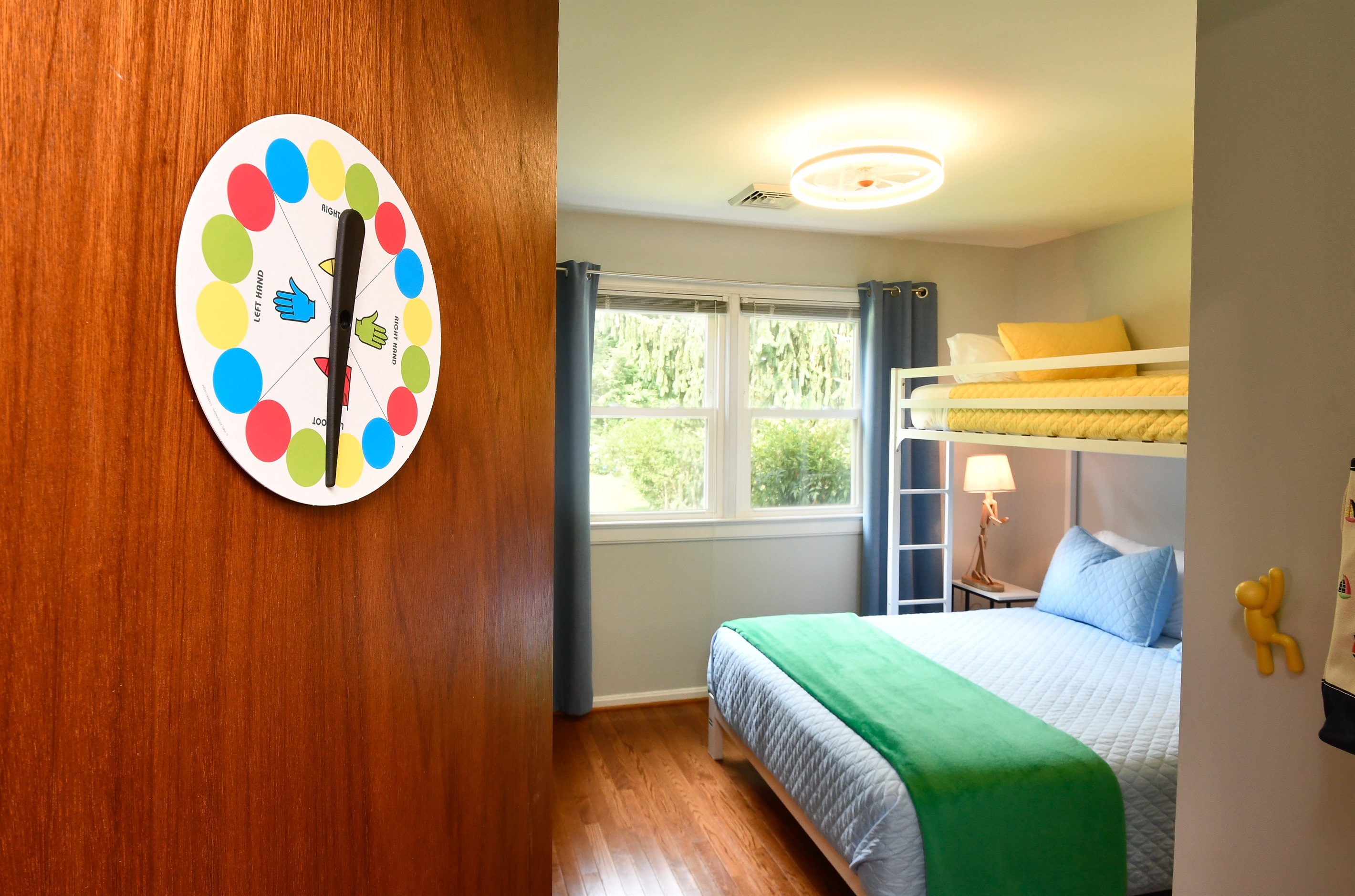 Or will it be door #4? Choose the Twister room for work, sleep or play. Queen bed with a twin bunk above it. Even the lamps are joining in the game.
