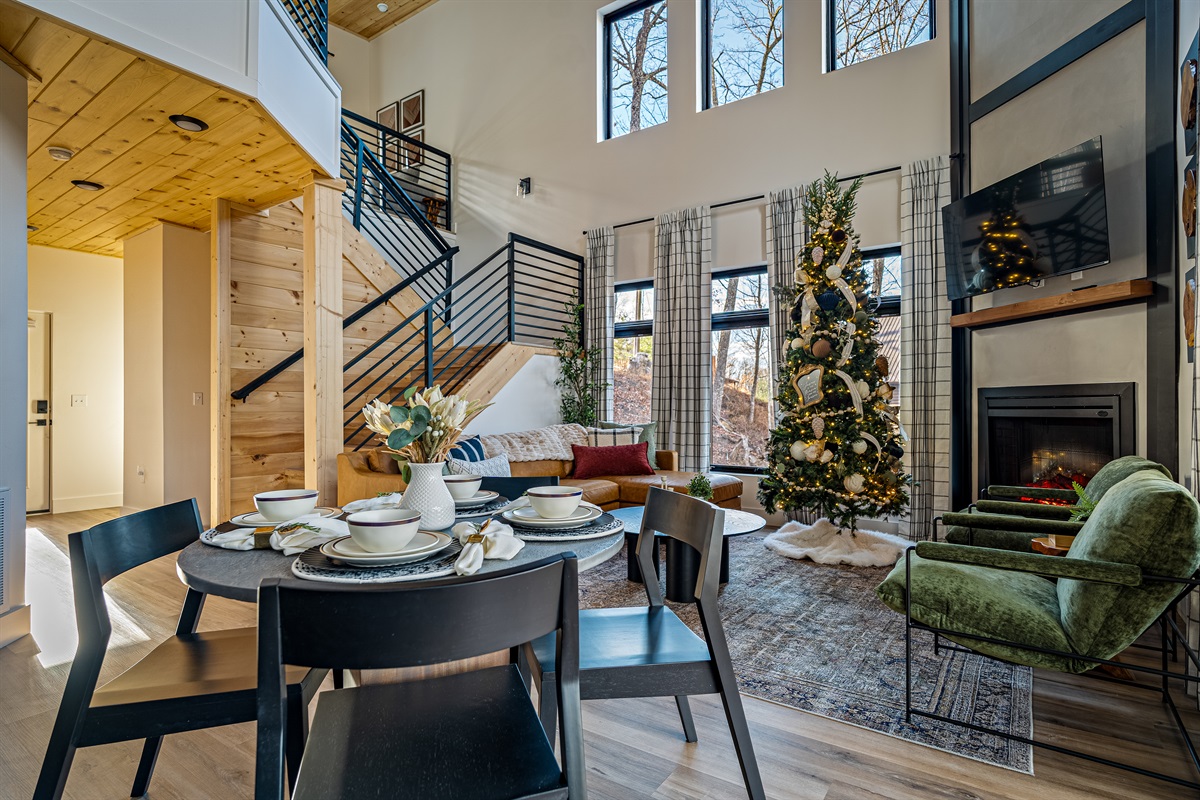 Soaring ceilings and floor-to-ceiling windows create the perfect light-filled gathering space.