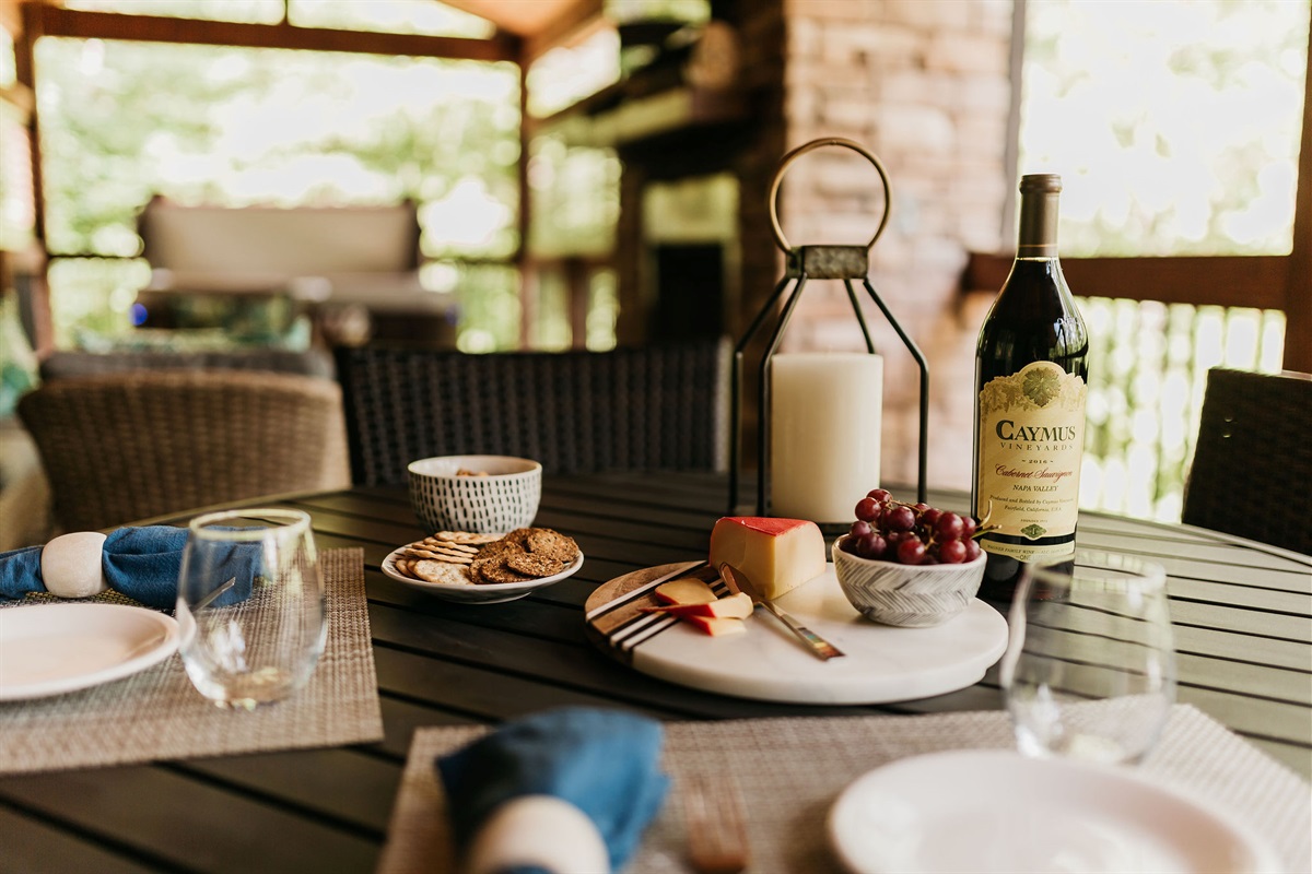 Dining Oasis: Savor delightful meals with a scenic backdrop and fine wines at this inviting table!