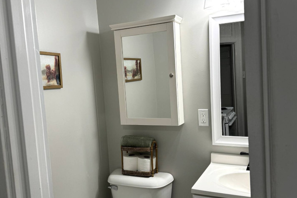 Freshen up in a bright, tidy bath stocked with everything you need for your stay.