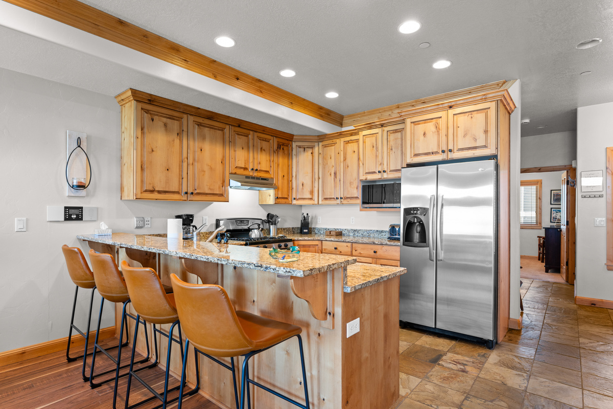 Large kitchen island with seating for casual meals and conversation.