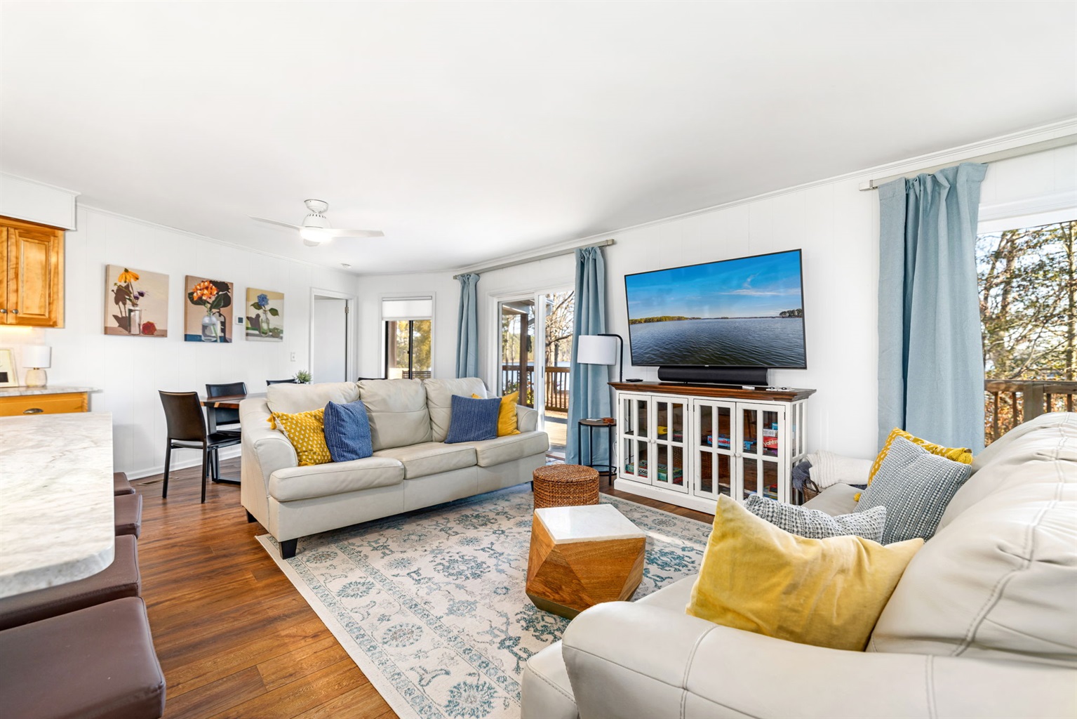 Living Room: Bright and airy space with comfy seating and stunning views for relaxing evenings!