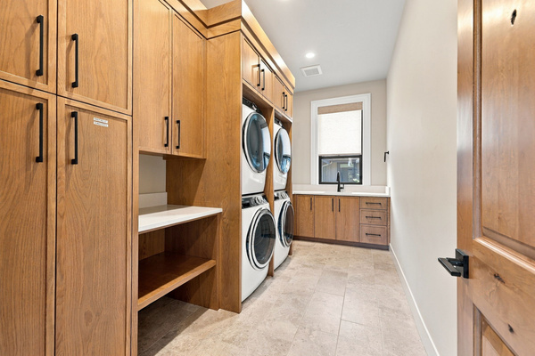 Two stacked washer/dryer sets make laundry easy for longer stays and larger groups