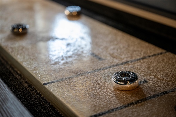 Shuffleboard ready for a friendly match—an easy favorite for relaxed competition and time together.