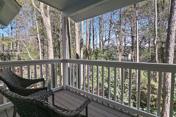 Charming Guest Bedroom: This room boasts a comfortable queen bed and a fun bunk bed setup, complete with a private balcony, making it perfect for families.