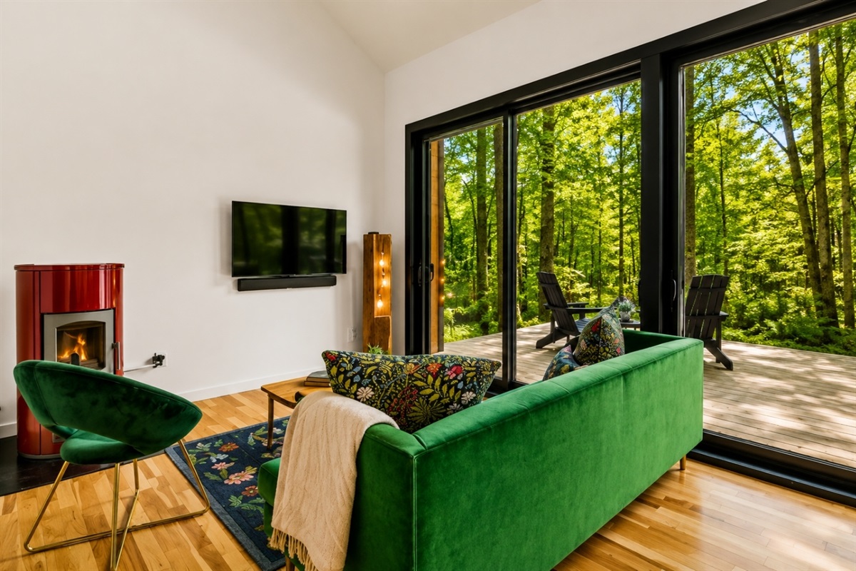Step into ultimate comfort and relaxation in our inviting lounge, featuring plush green sofas that provide the perfect place to unwind. Whether you're catching up with friends or simply enjoying some quiet time, the warmth of the built-in heater crea