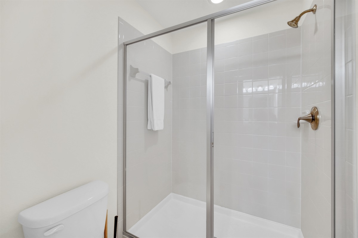 Second Main Floor Bathroom attached to king sized bedroom with walk in shower