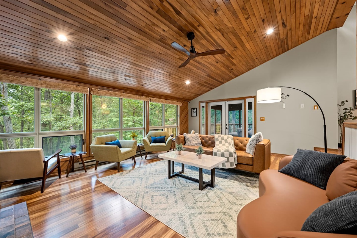 Brazilian Cherry on the floors.  Tongue and groove ceiling.  Real leather and marble surfaces.  Hexagon chairs.  I can't help myself and I'll say it again: this room just drips mid-century modern.