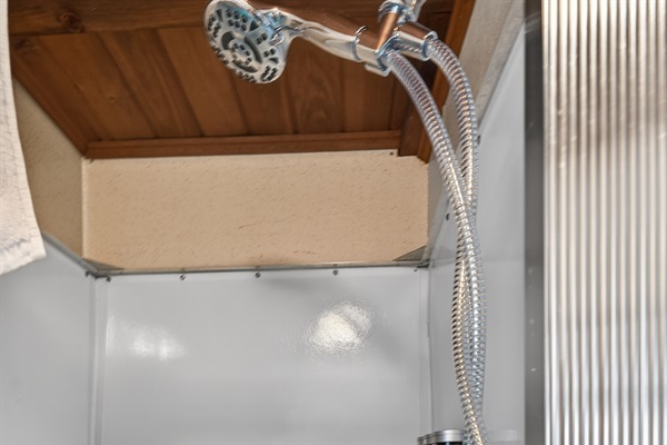 A peaceful full bathroom with a shower that feels fresh and easy!