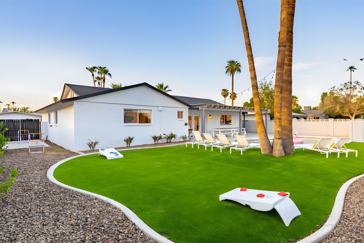 Play cornhole or ladder ball while the kids or dogs run in the large grassy yard