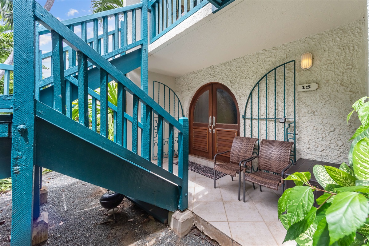 Charming archways and vibrant colors set the tone for your stay. This is the exterior/front door to the condo.