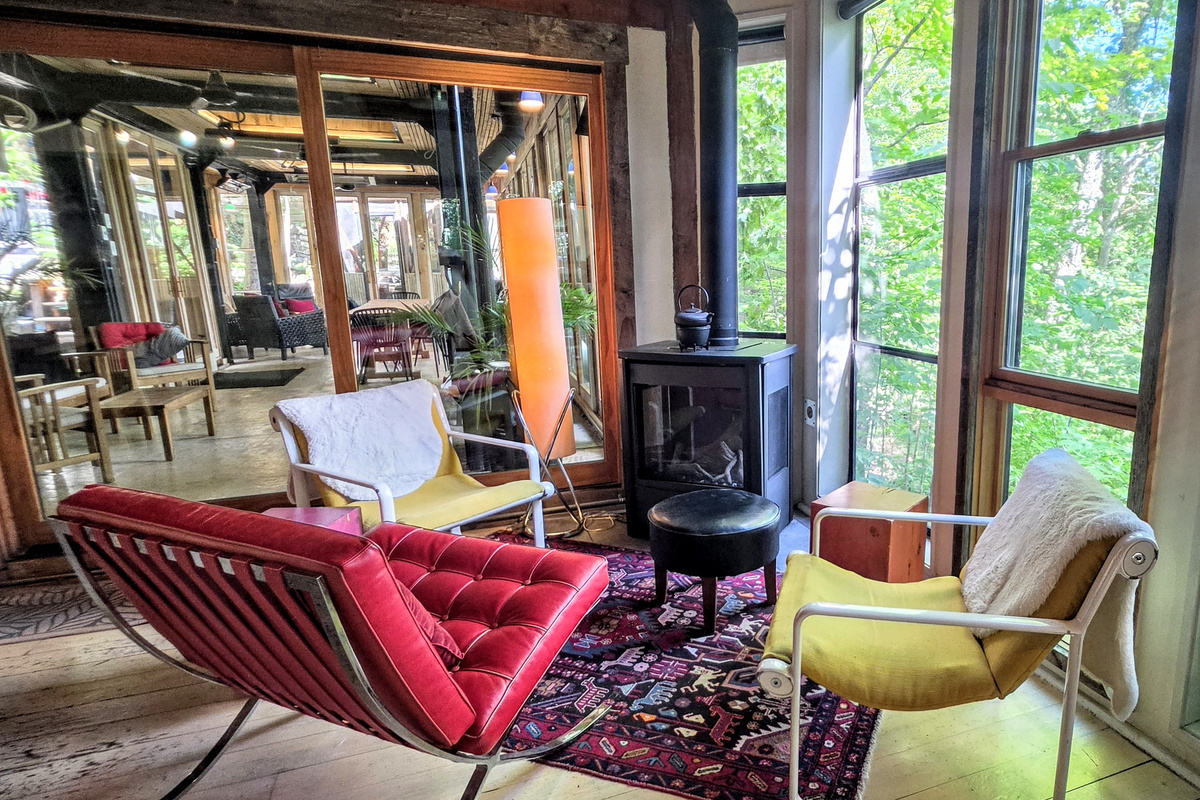 Cozy seating by the stove 
 with view of the lake