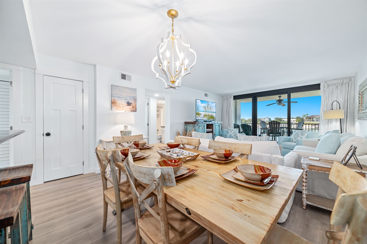 Dine with a view. Floor-to-ceiling windows flood this elegant space with light, offering a captivating coastal vista from the comfort of your table.