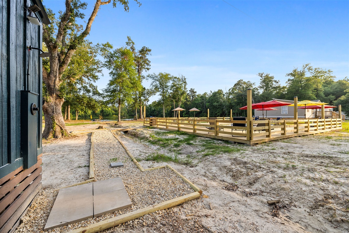 Shared Outside Shower & Pool with Large Deck over looking 6 acre Lake