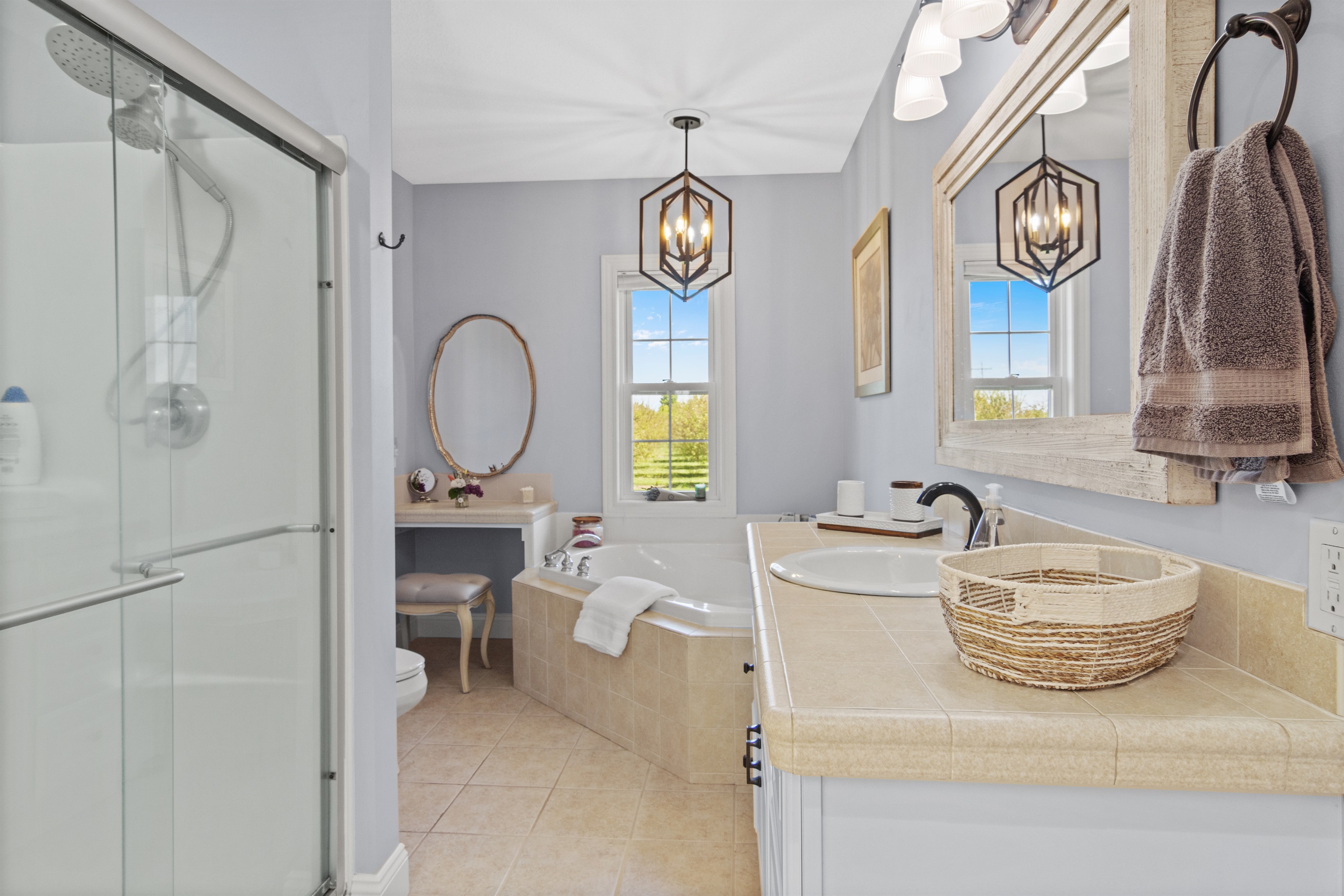 Full bathroom connected to the main level king bedroom for ultimate convenience