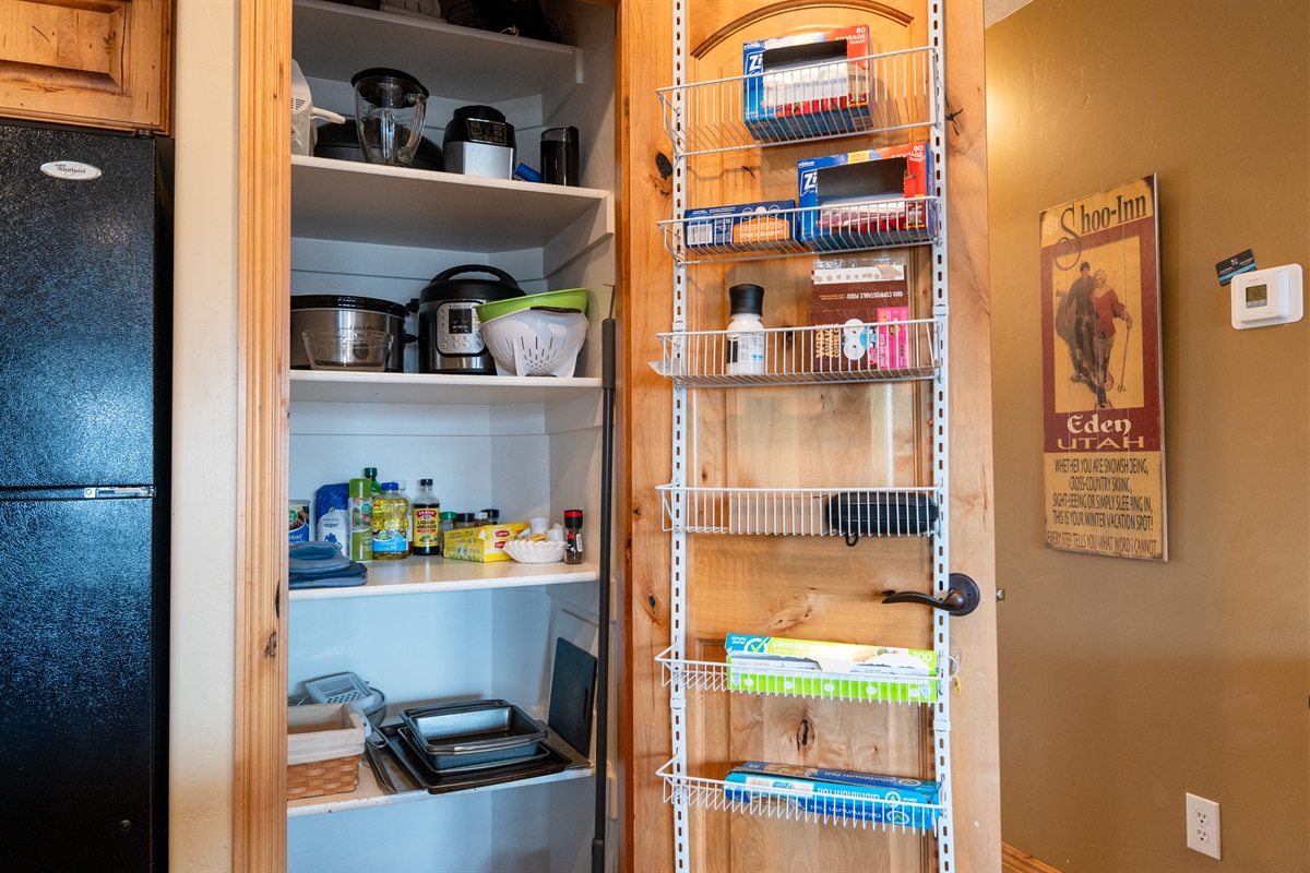 Well-stocked pantry with essentials and storage to make longer stays easy and comfortable.