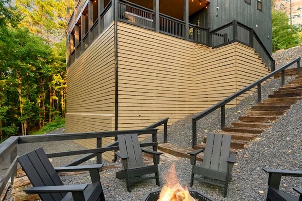 Fire pit area looking back at the Honeycomb Hideout!  We installed handrails so guests can walk up and down the stairs safely.