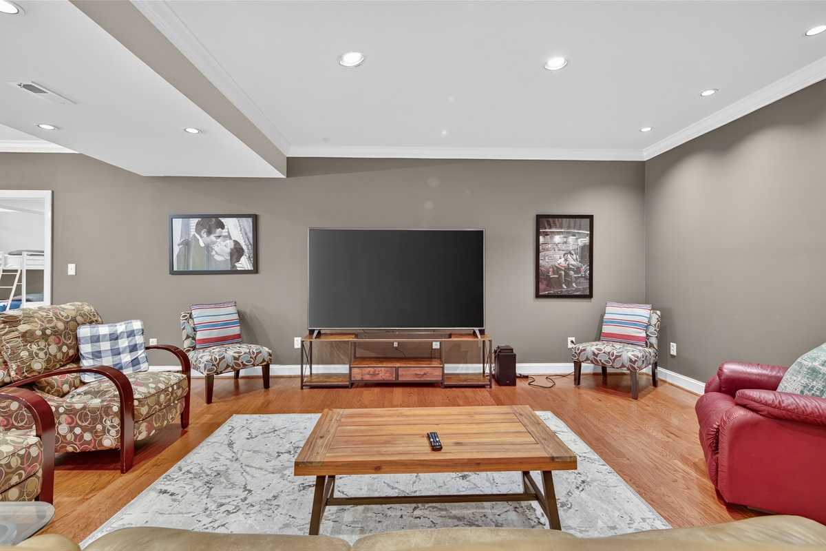 Comfortable seating and big-screen TV for group viewing.