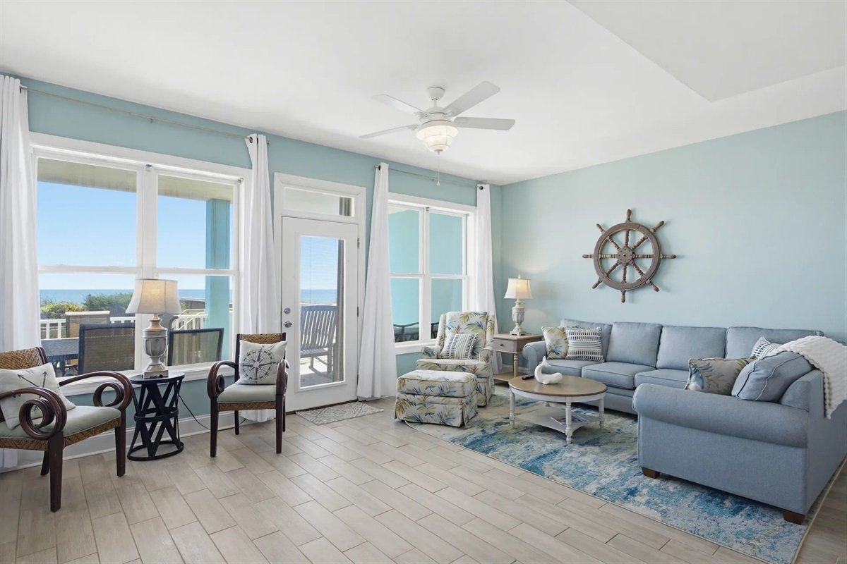 Relax on the new comfortable seating in the oceanfront living room